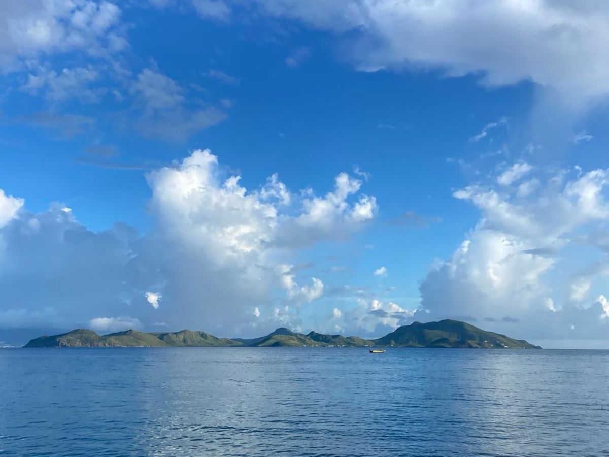 An island seen across the water from the shore